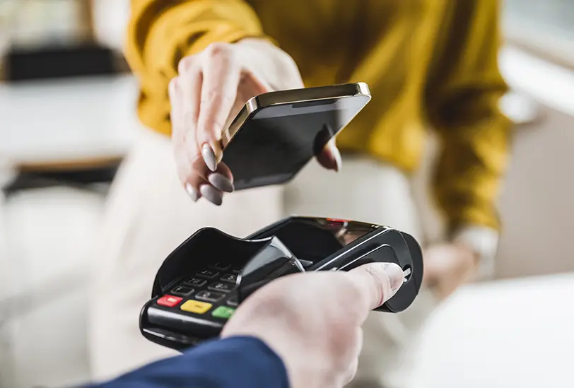 hand paying with phon